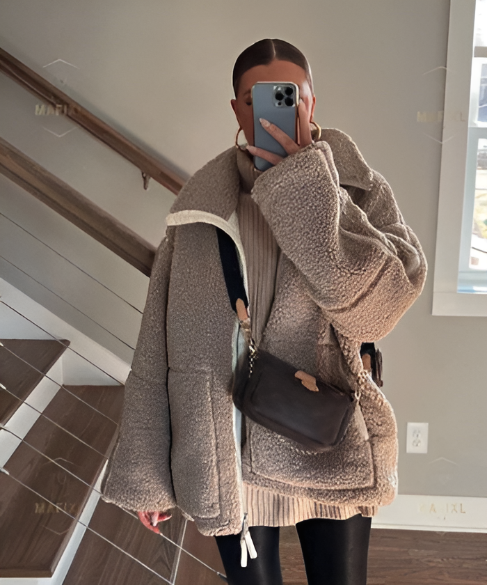 Manteau fausse fourrure femme effet teddy oversize à revers