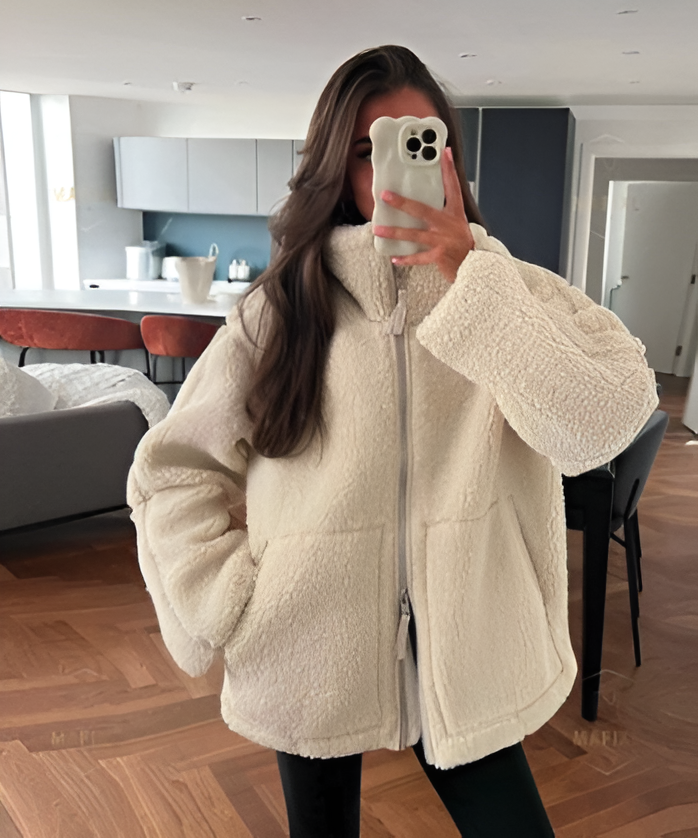 Manteau fausse fourrure femme effet teddy oversize à revers