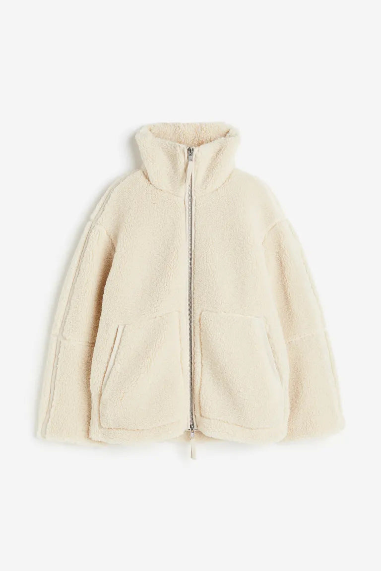 Manteau fausse fourrure femme effet teddy oversize à revers