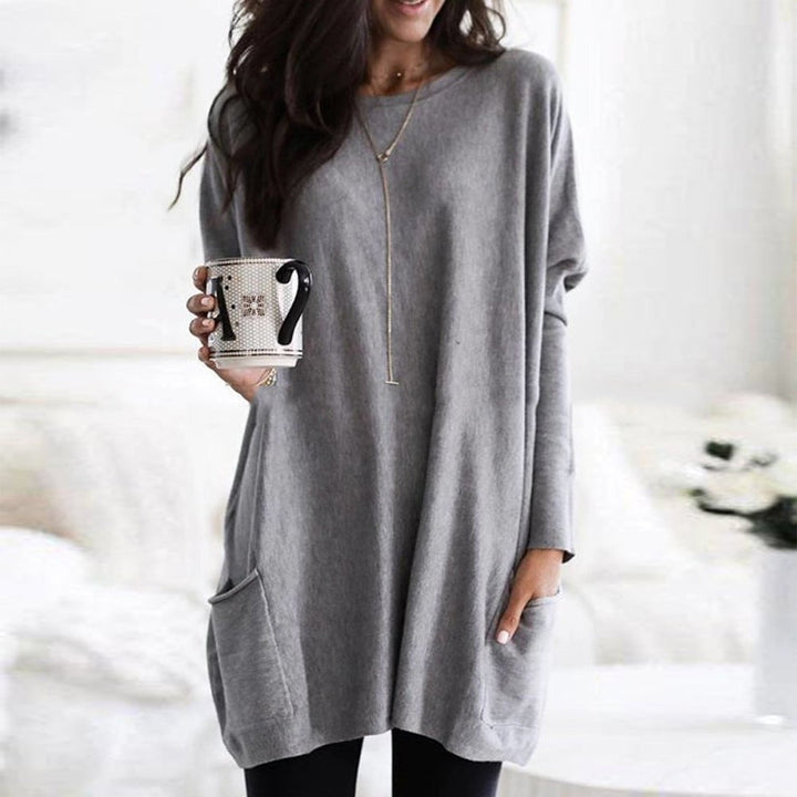 Pull oversize femme col rond à poches et longueur tunique