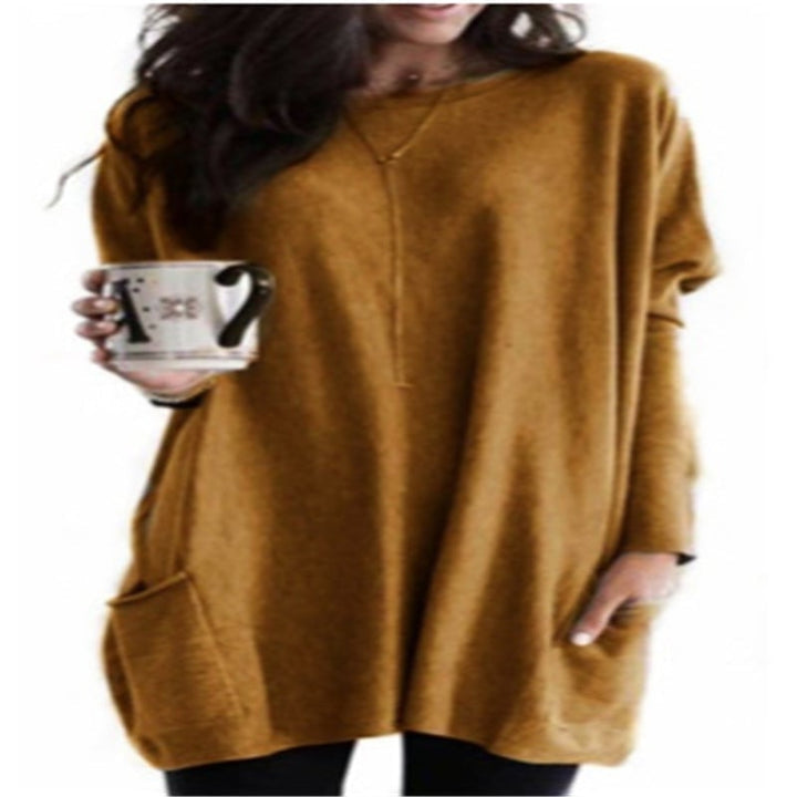Pull oversize femme col rond à poches et longueur tunique