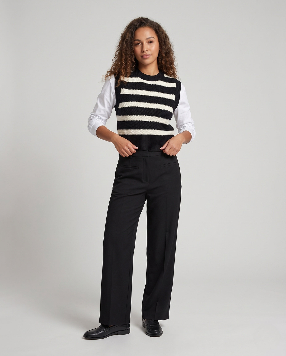 Pull sans manche femme rayé en maille fine, finitions côtelées