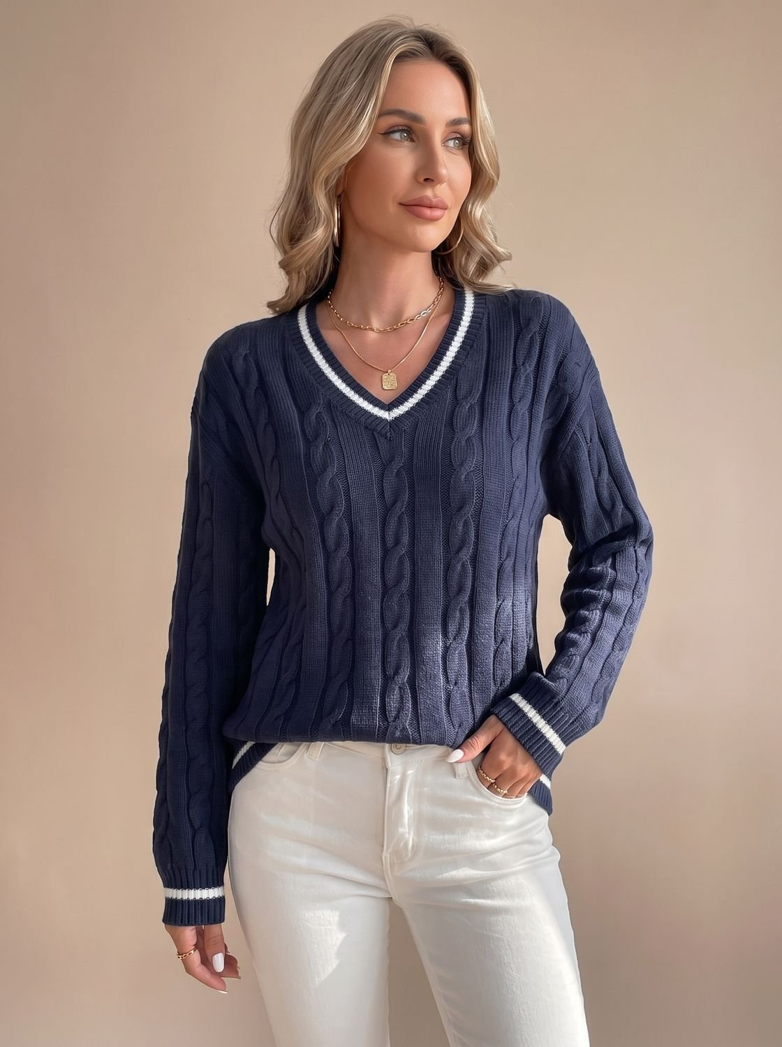 Pull torsadé femme col V à liserés rayés contrastants