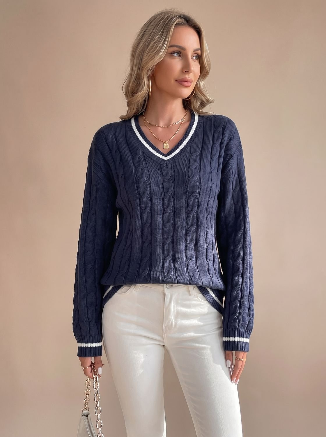 Pull torsadé femme col V à liserés rayés contrastants